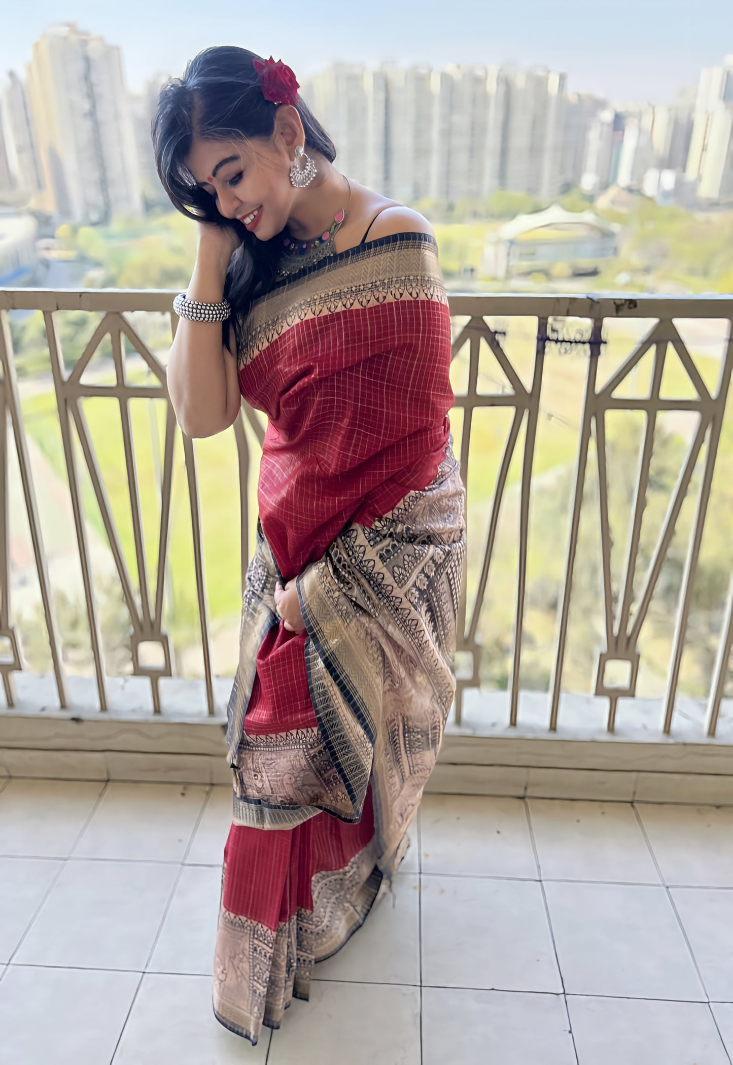 Crimson cotton silk saree with Madhubani and Mangalgiri patterns, gold border detail.