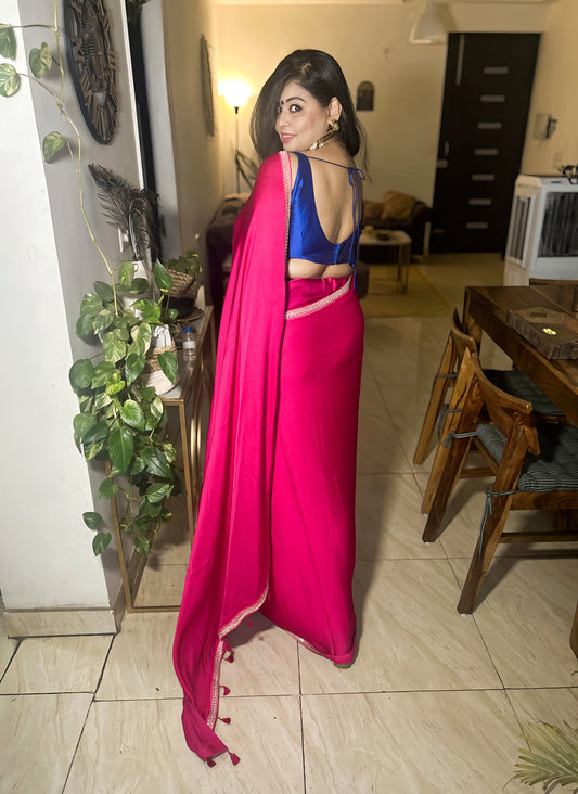 Raniyat – Bright Rani Modal Silk Saree with Signature Border