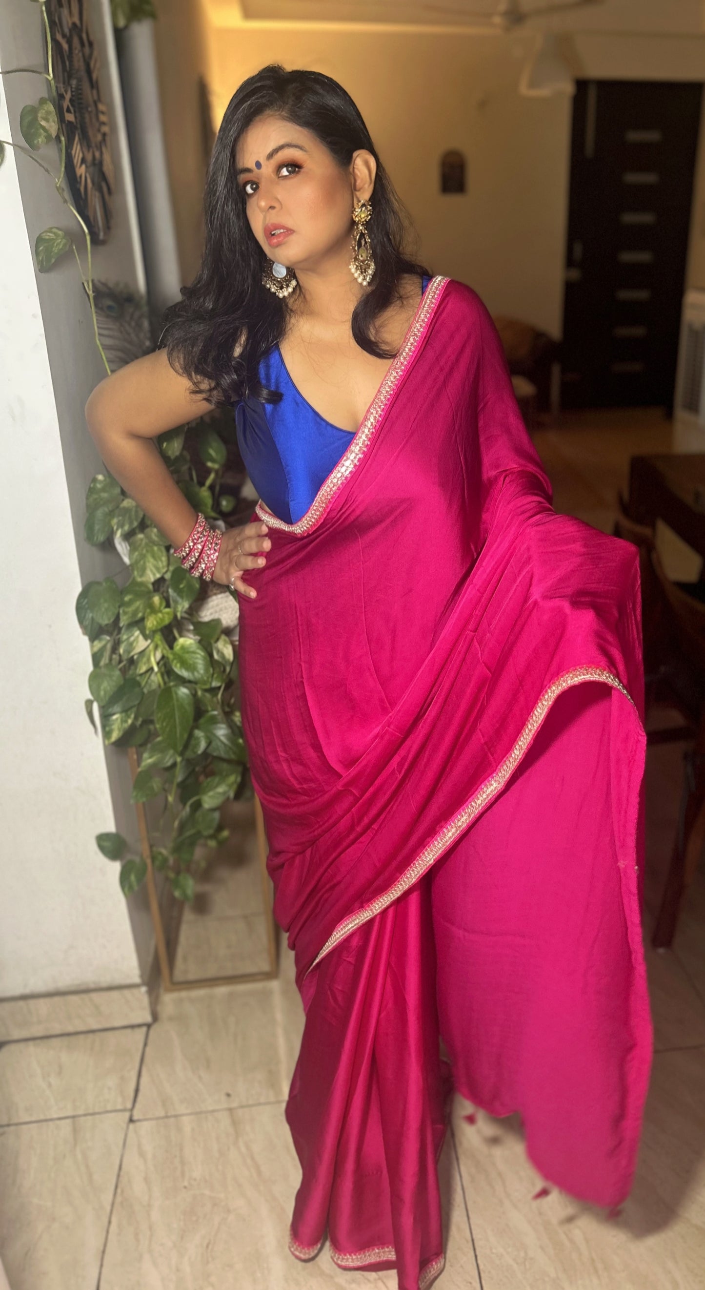Raniyat – Bright Rani Modal Silk Saree with Signature Border