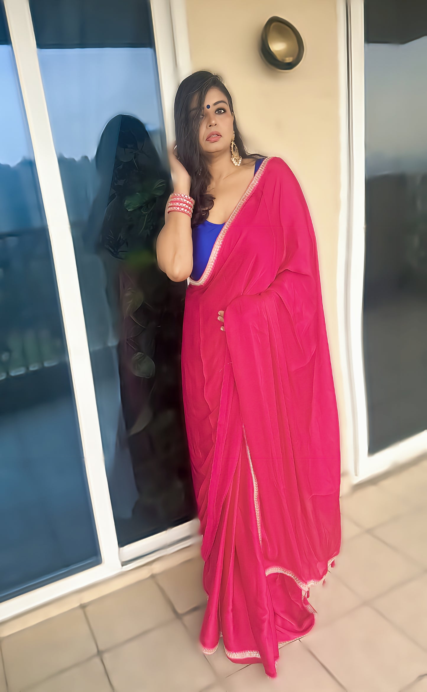 Raniyat – Bright Rani Modal Silk Saree with Signature Border