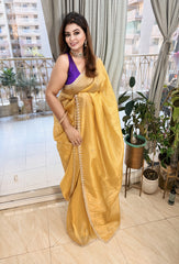 Suvarna Aura – Pure Golden Tissue Saree with Handcrafted Cutdana & Sequin Work