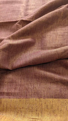Mauve jute linen fabric with textured weave and contrasting golden border.