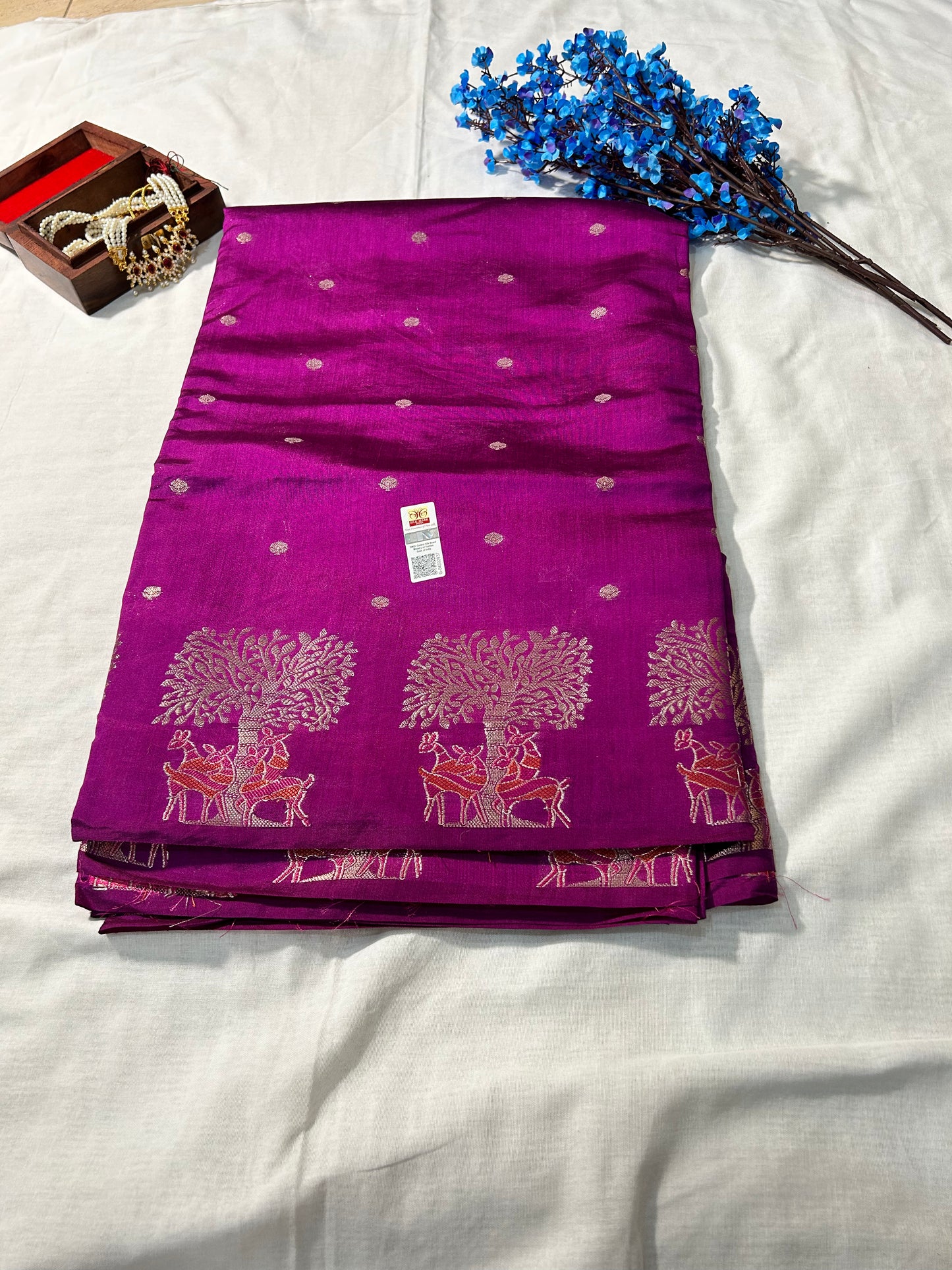 Royal amethyst raw mango silk saree with intricate gold tree motifs and dotted pattern, festive banarasi design.