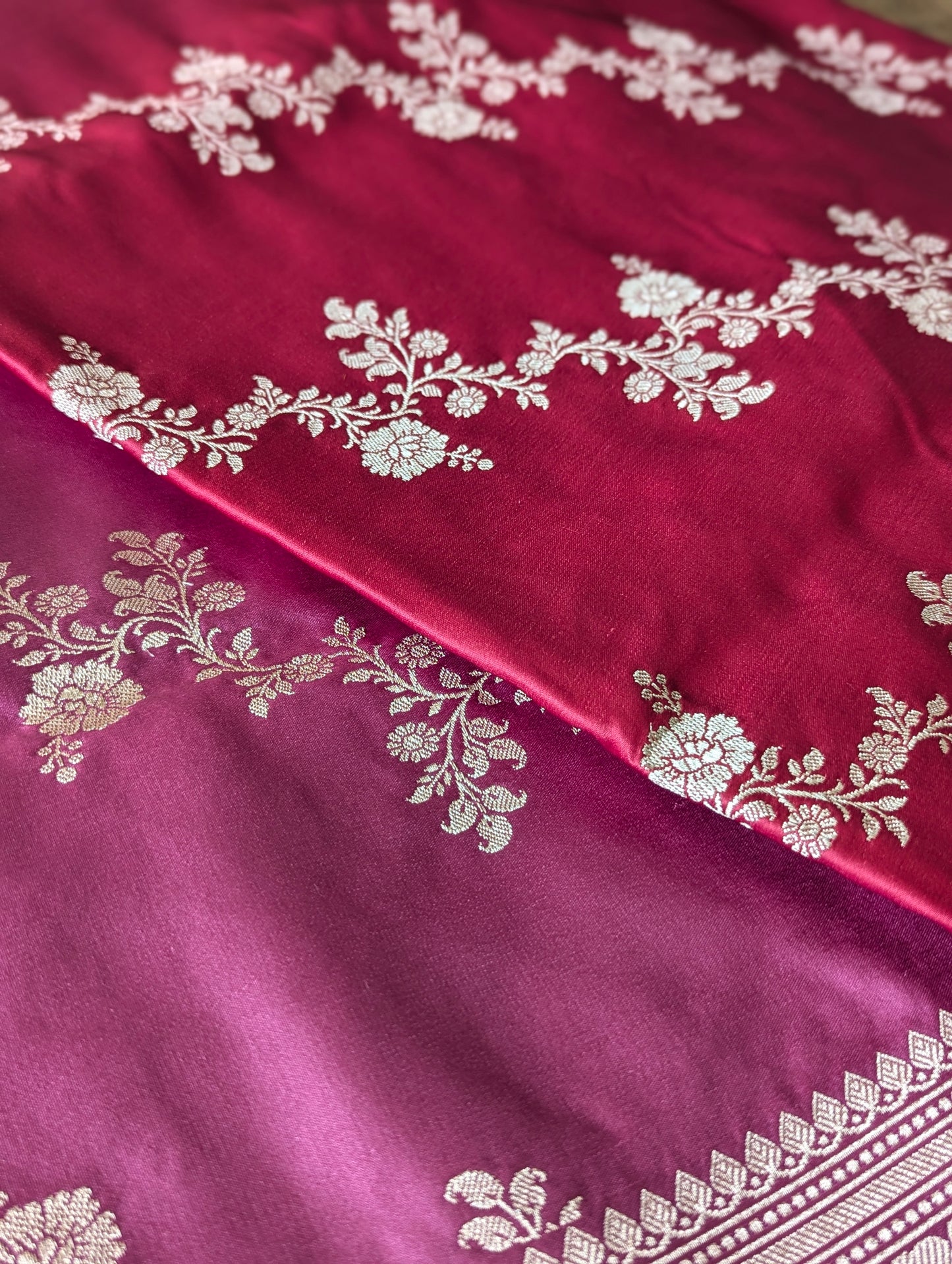 Ombre mashru silk saree in deep magenta and lavender with intricate silver floral and geometric border designs.