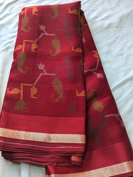 Crimson red Kota silk saree with multicolor abstract motifs and gold border stripe.