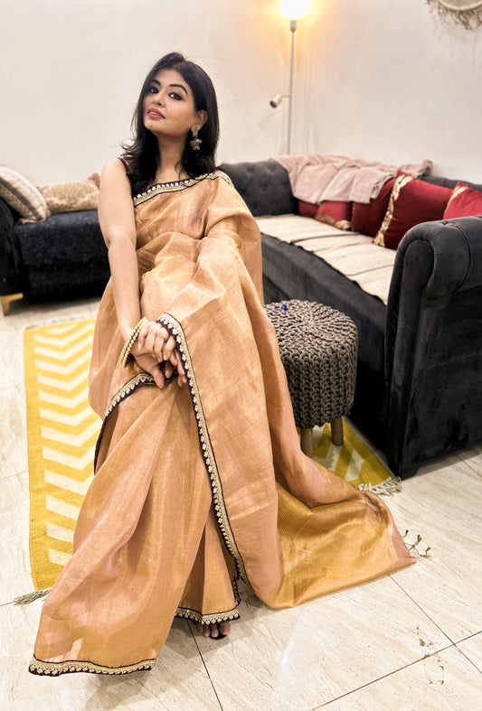Ishira – Light Golden Tissue Linen Saree with Wine Zardosi Lace Border
