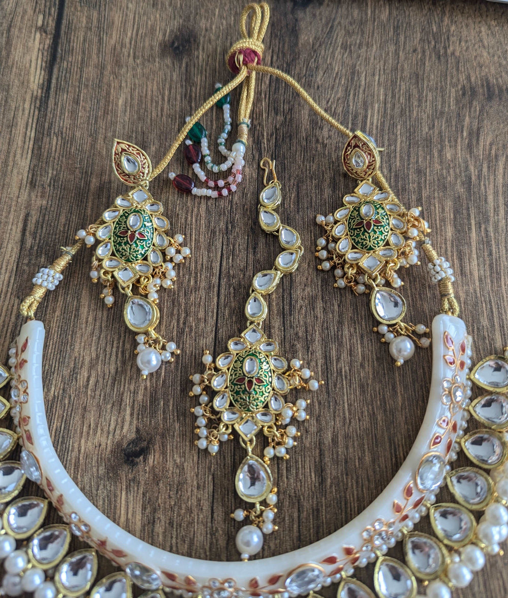 Ethereal Red Meenakari Rajwadi Kundan Set